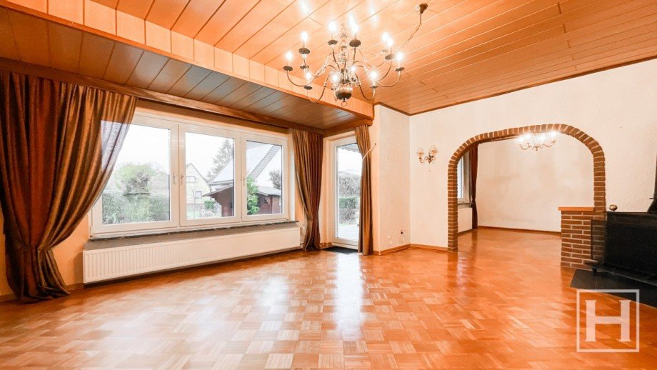 Wohnzimmer mit Blick ins Esszimmer Einfamilienhaus Kayhude