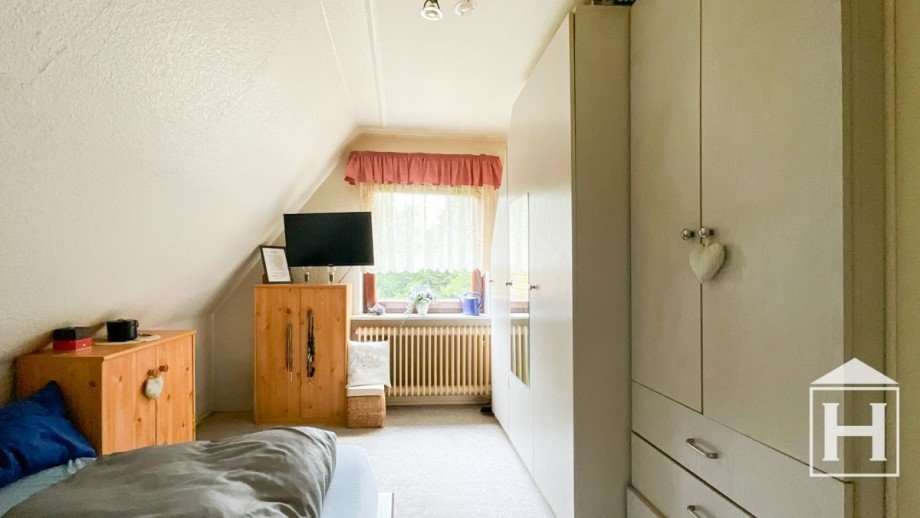 Schlafzimmer eins Obergeschoss Einfamilienhaus Heidm�hlen