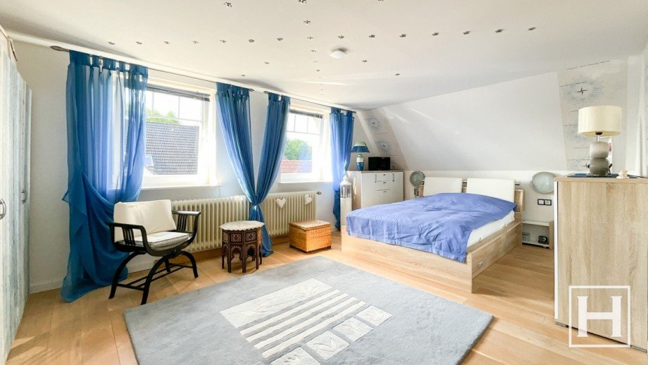 Elternschlafzimmer im Dachgeschoss Einfamilienhaus Stuvenborn