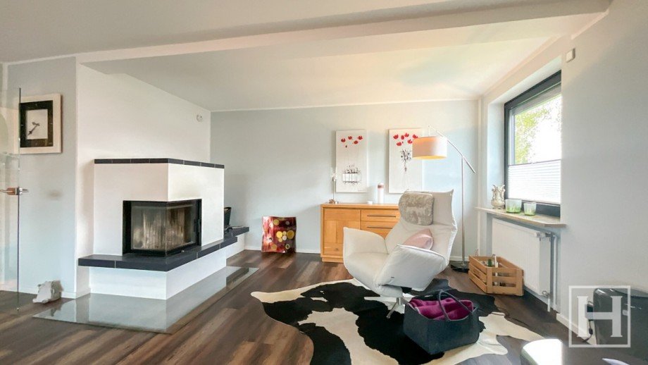 Wohnzimmer mit Kamin Einfamilienhaus Neum�nster