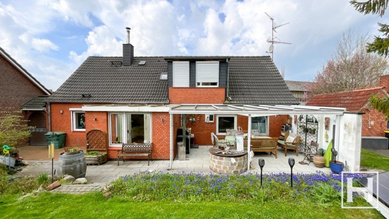 R�ckw�rtige Hausansicht Glasau-Sarau Einfamilienhaus Freiraum f�r Lebensideen