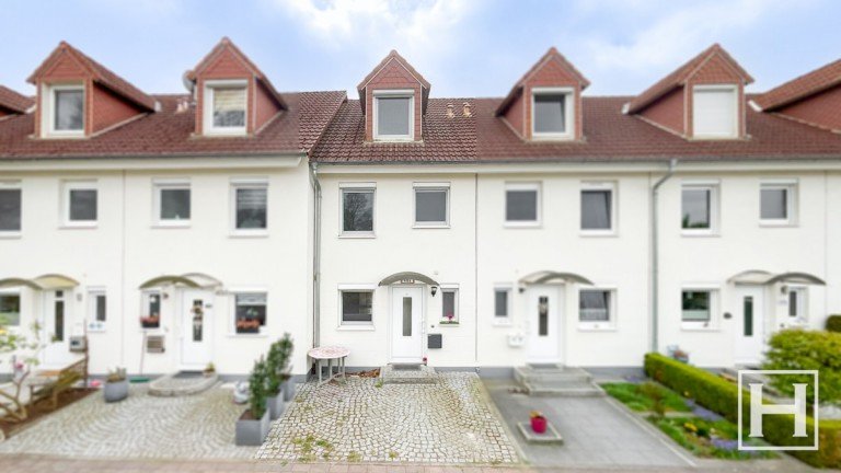 Vorderansicht Kaltenkirchen Reihenmittelhaus Hier beginnt Zuhause