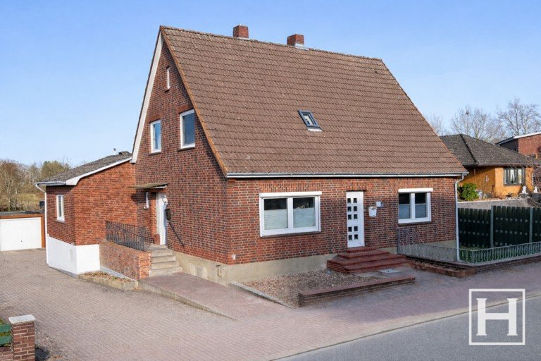 Vorderansicht Sieversh�tten Zweifamilienhaus Investment mit Zukunftspotenzial