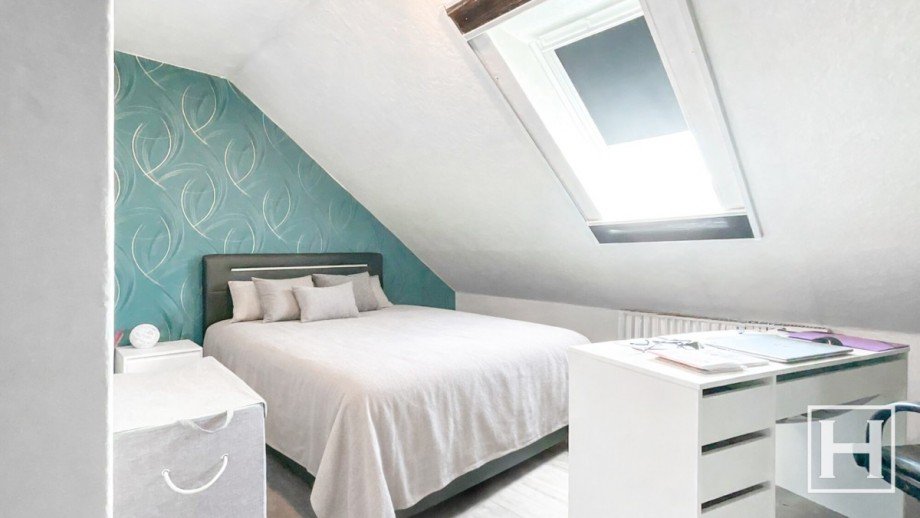 Schlafzimmer im Obergeschoss Reihenmittelhaus Fahrenkrug