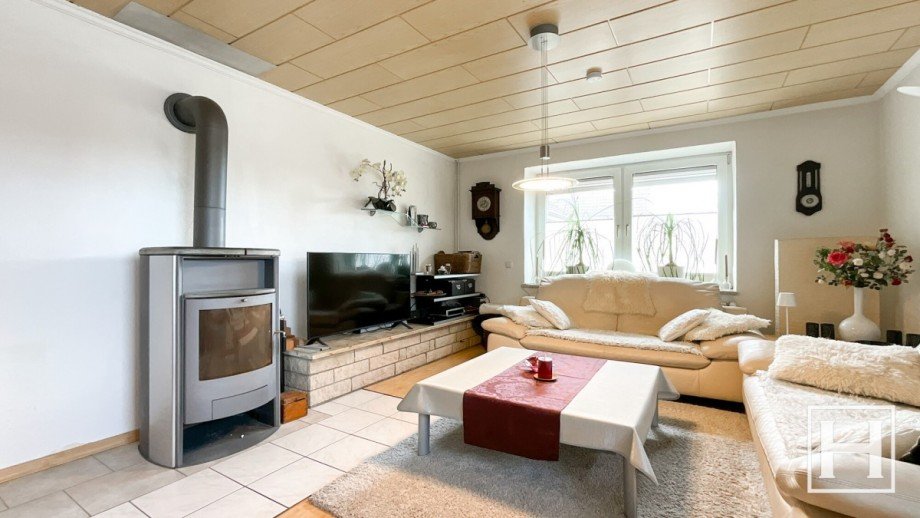 Gem�tliches Wohnzimmer mit Kamin Einfamilienhaus Glasau-Sarau